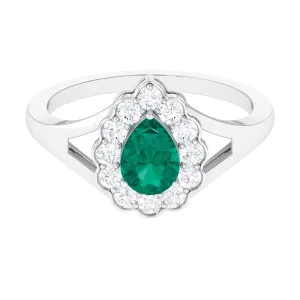 Pear Shaped Emerald Halo Engagement Ring with Diamond in Split Shank