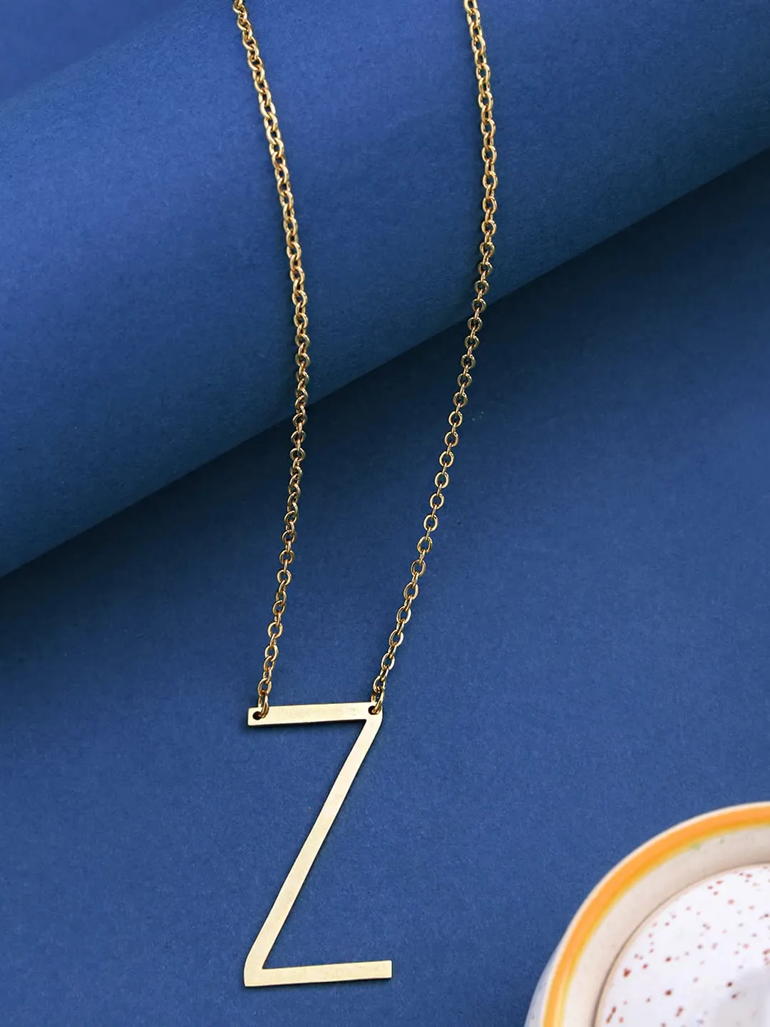 Yellow Chimes Latest Fashion Stainless Steel Gold Plated Initial Pendant with Alphabet Z for Women and Girls, Medium (YCFJPD-ALPHBTZ-GL)